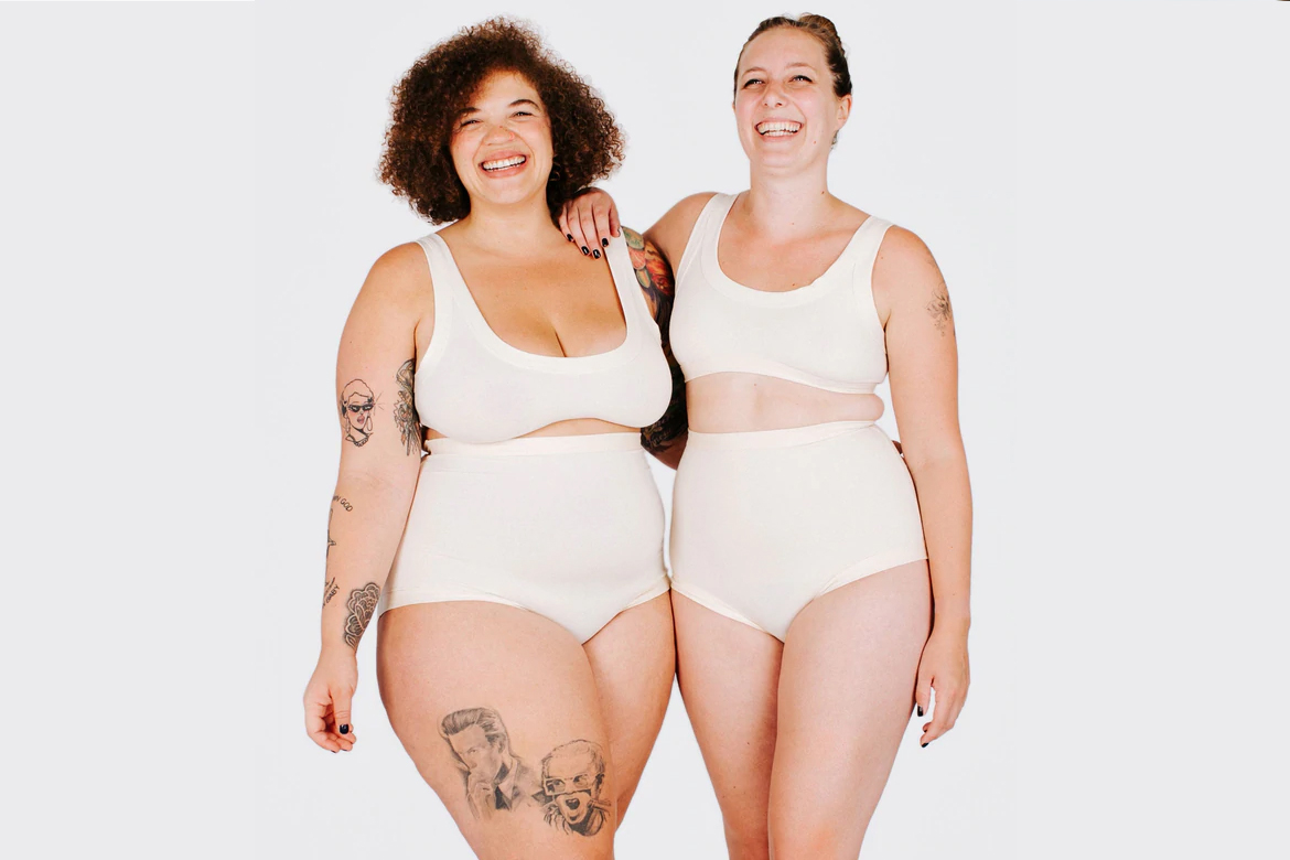 Two people wearing Sky Rise underwear and Original Crops.