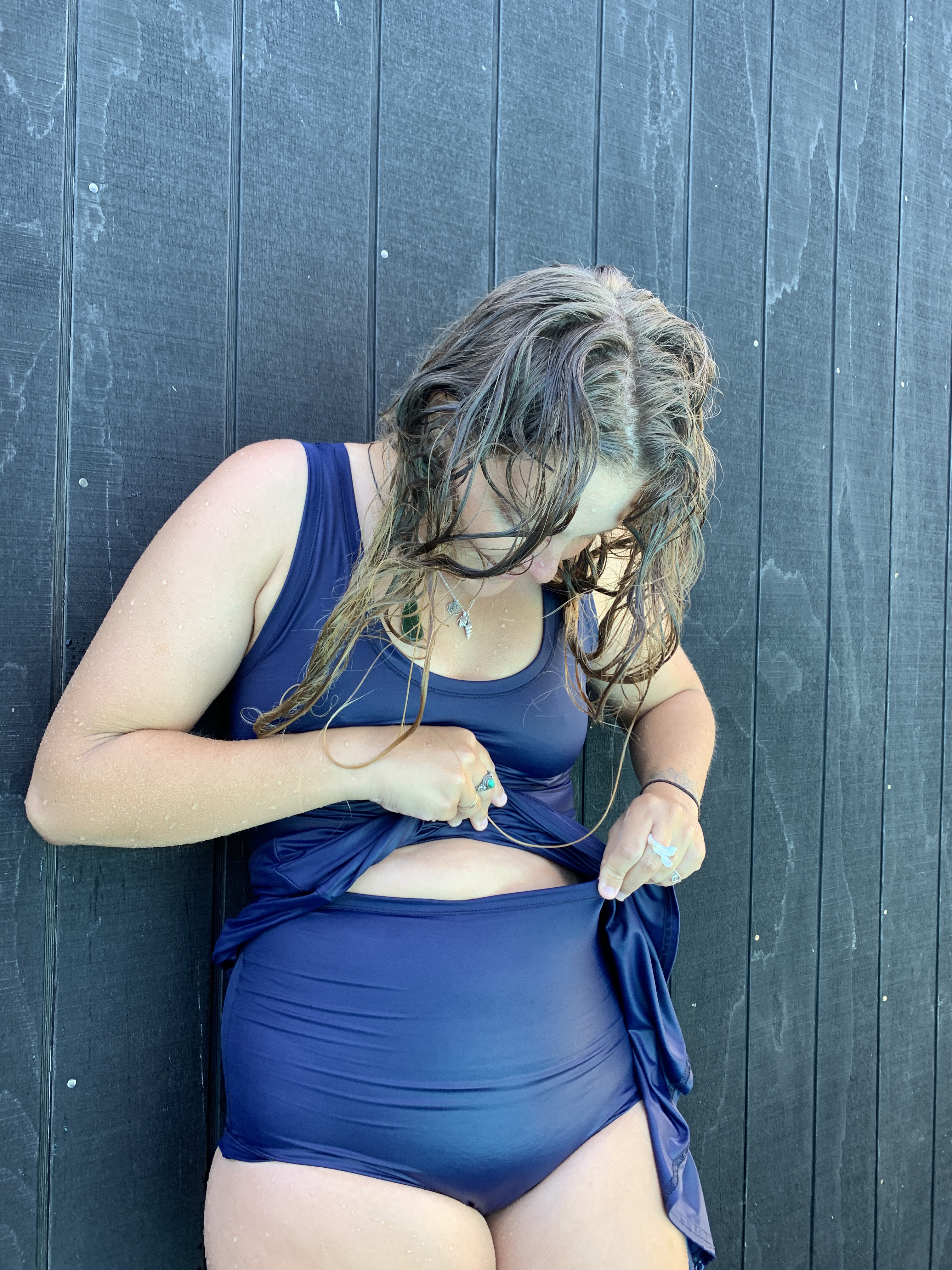 Flared Swim Dress and high waist swim pants on person after a swim