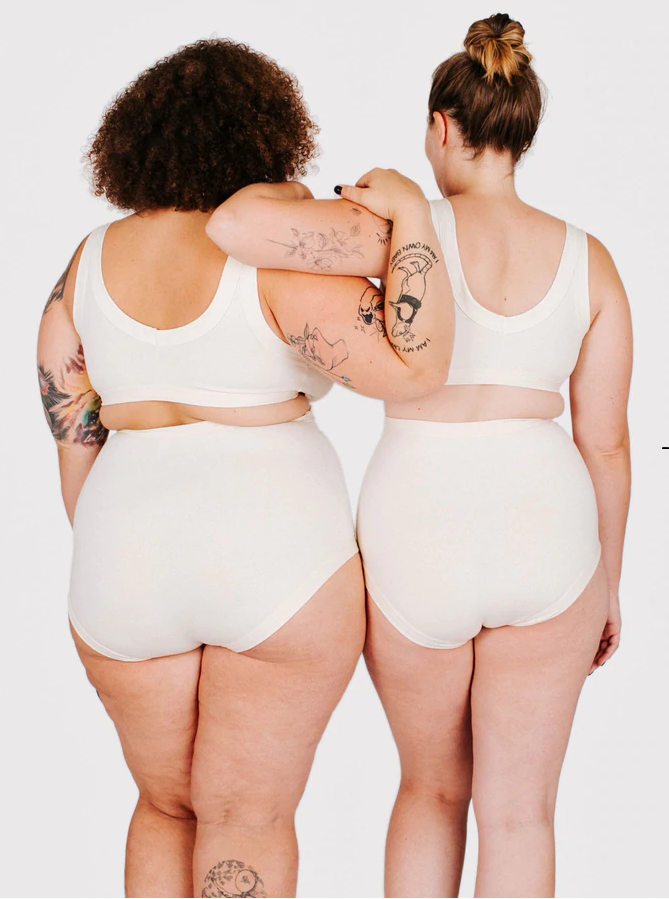 Sky Rise fit shot on people standing, back