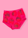 Pink high-waisted underwear with red patterns on a pink background