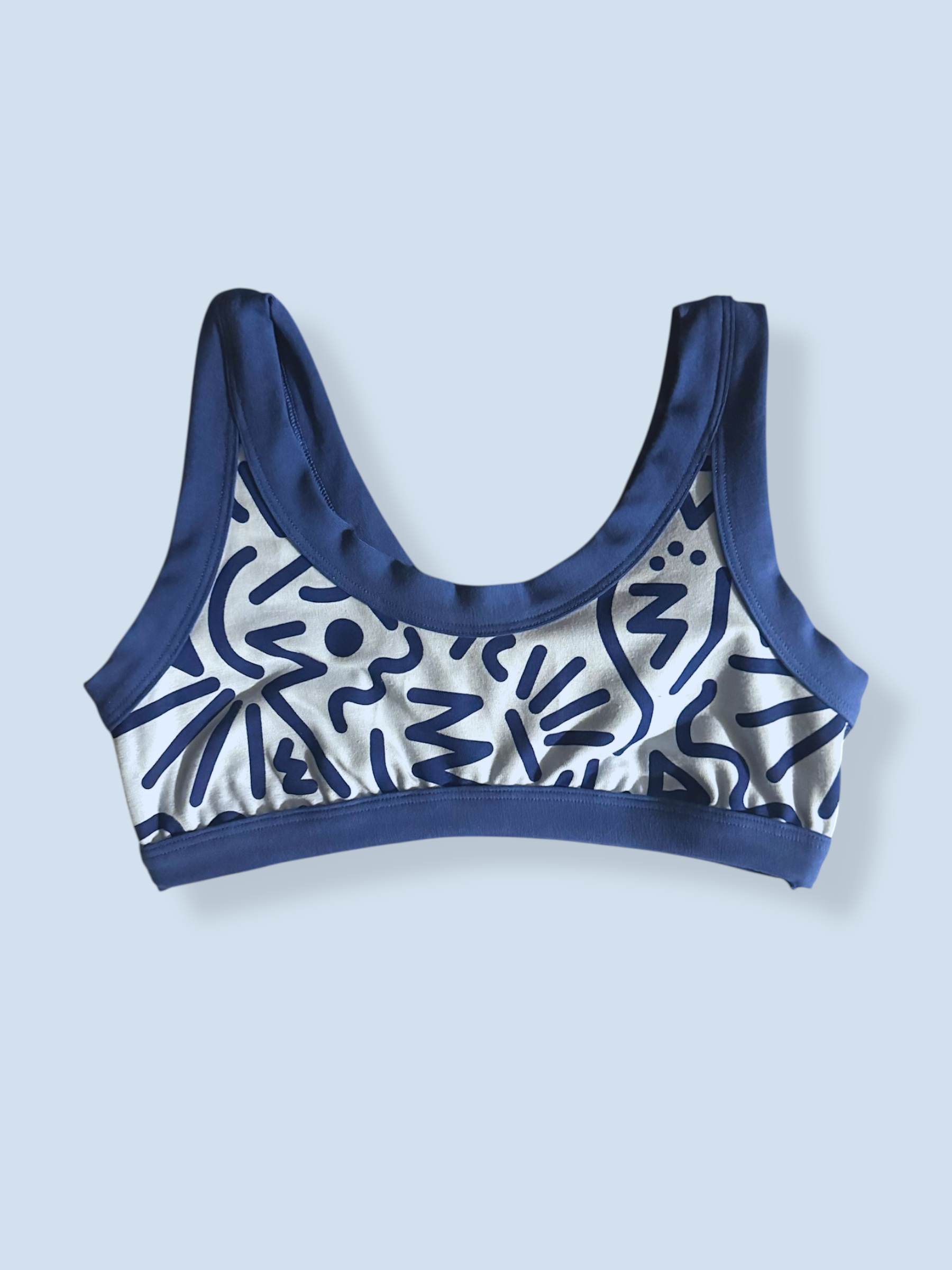 Energy Vibes Crop Top laid flat