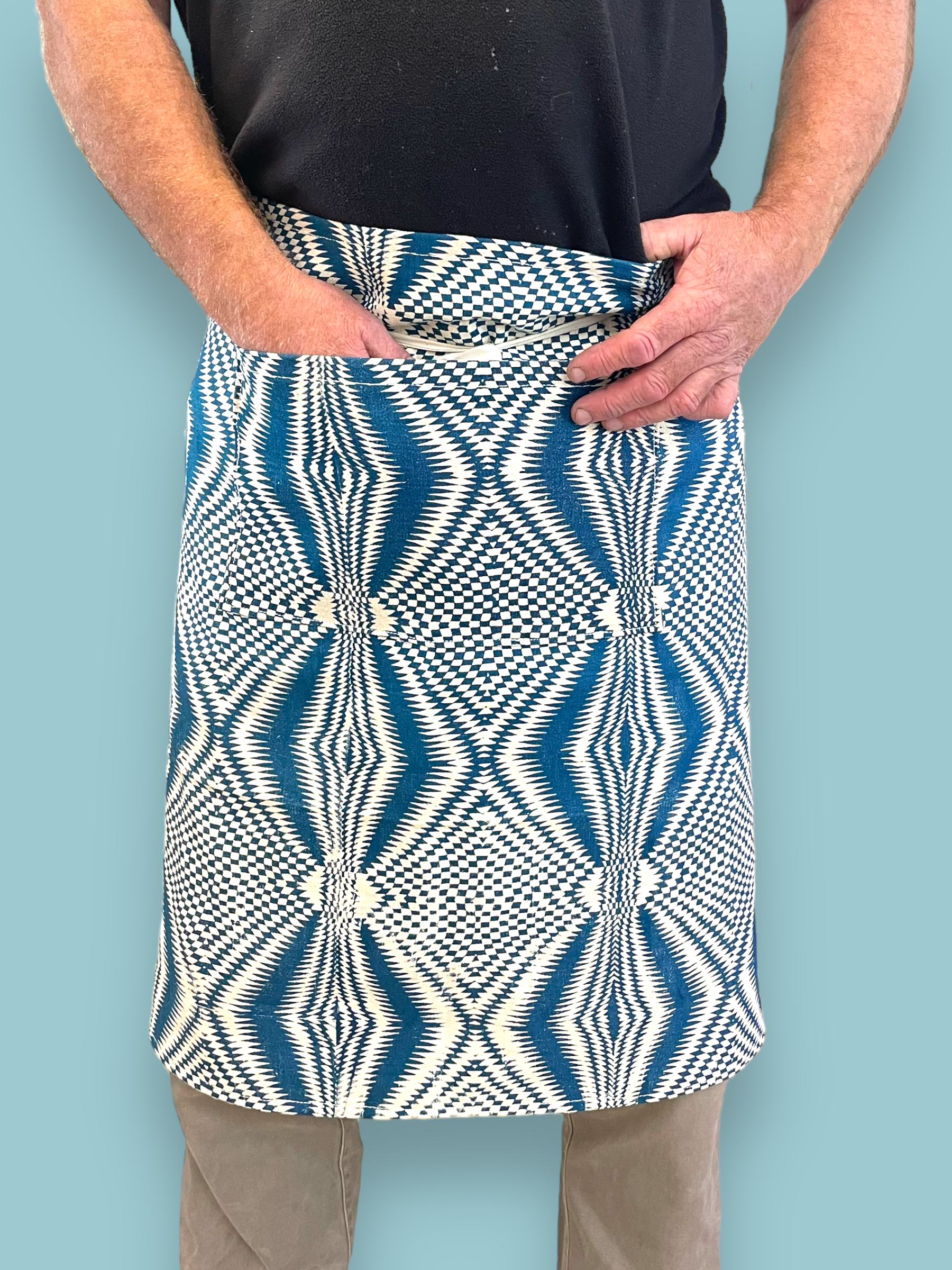 Picture of a person wearing handprinted apron