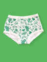 White underwear with a green pattern shown against a solid green background.