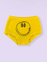 Yellow underpants with smiley face on light purple background