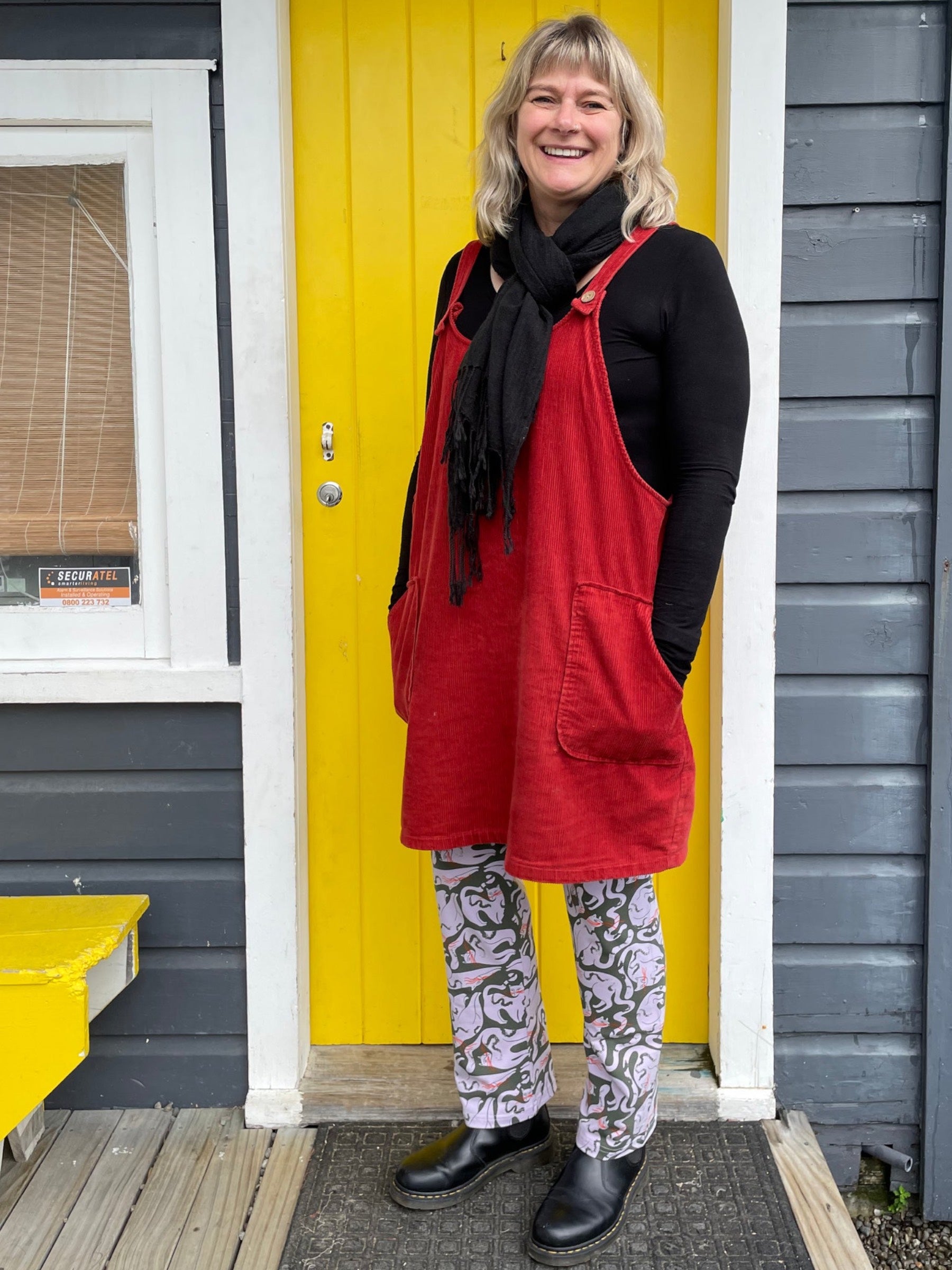 Puss Puss Straight Leg Pants worn under a pinafore