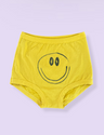 Yellow underwear with a smiley face design on a light purple background
