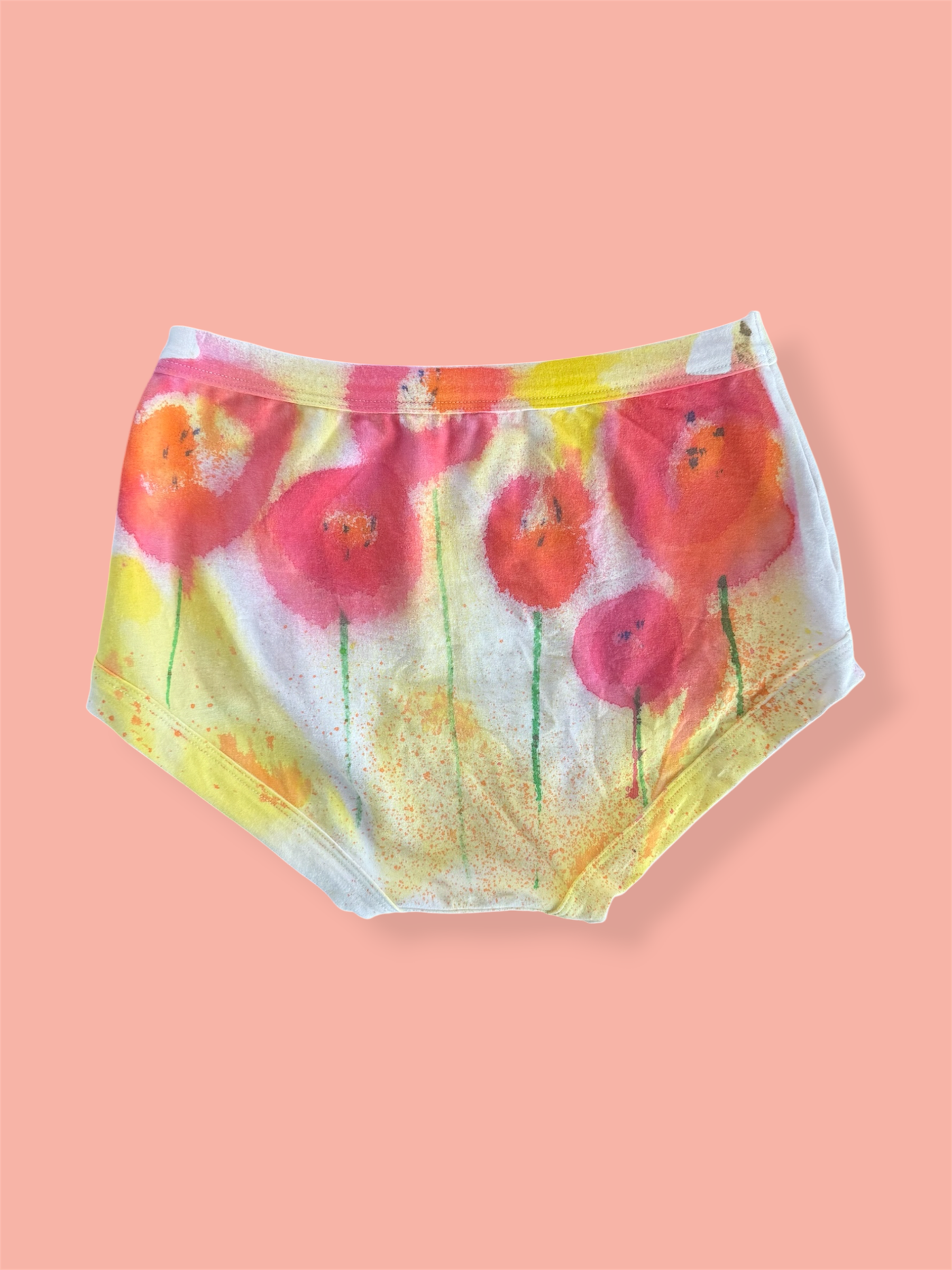 Floral-patterned underwear on a pink background