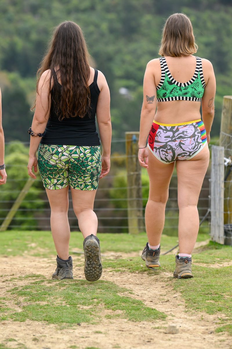 two models walking away